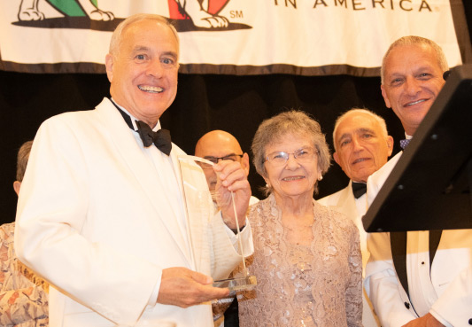 Comptroller DiNapoli holding the Guglielmo Marconi Award.