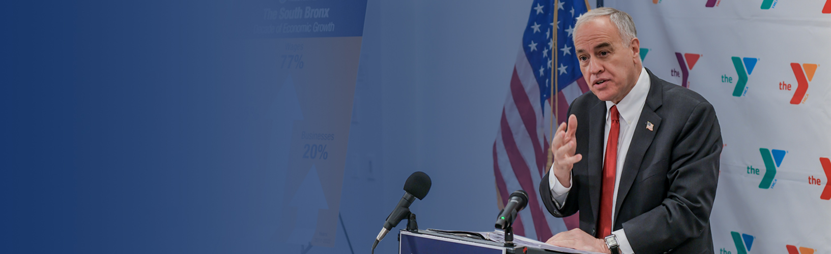 State Comptroller DiNapoli at a podium speaking at the South Bronx Economic Snapshot event