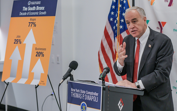 State Comptroller DiNapoli at a podium speaking at the South Bronx Economic Snapshot event