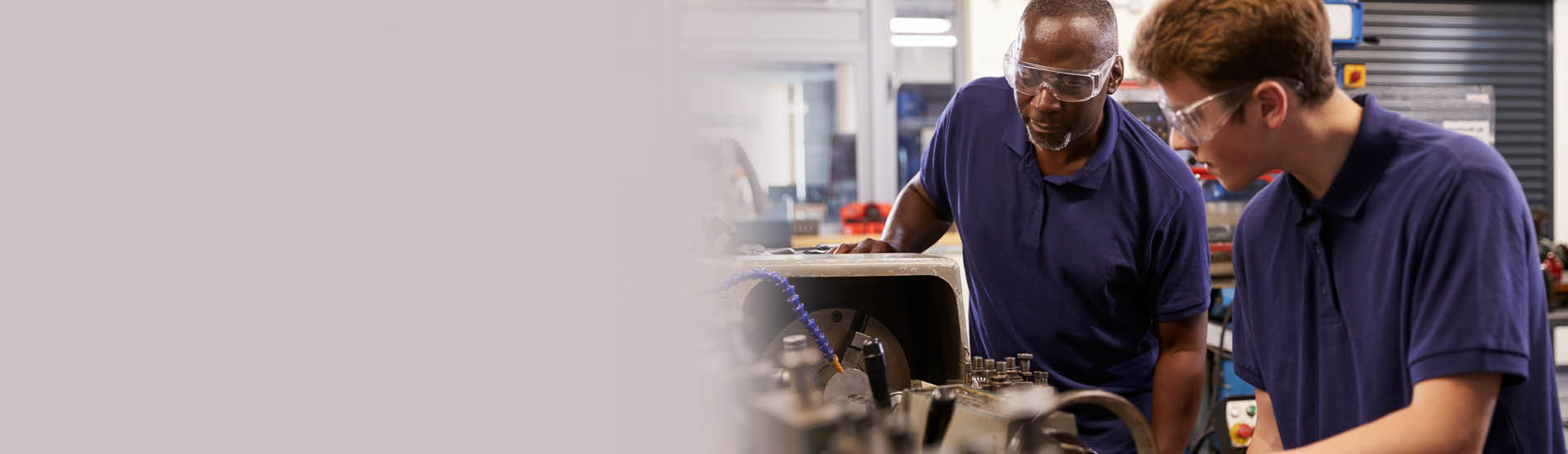 Two machinists working.