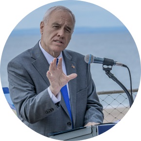 State Comptroller Thomas P DiNapoli speaking at a podium