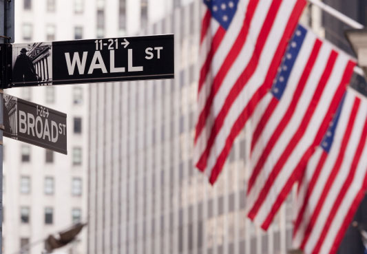 Street corner showing Wall Street and Broad Street signs