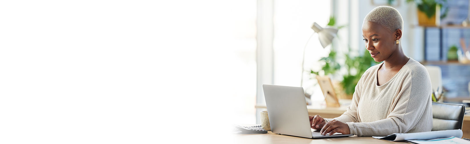 woman confidently using laptop