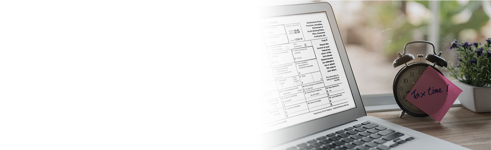 laptop with 1099-R on the screen