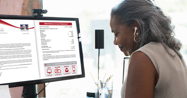 Woman viewing her Retiree Annual Statement on the computer