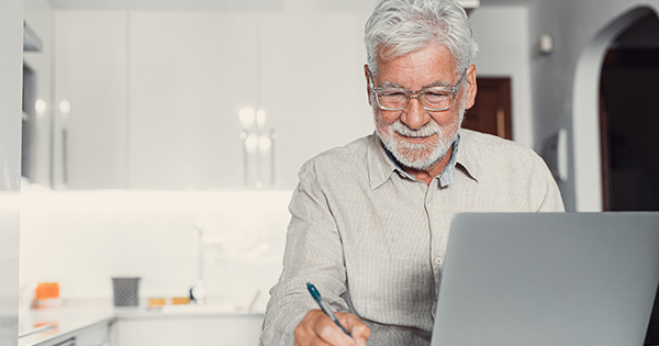 retiree at home computer