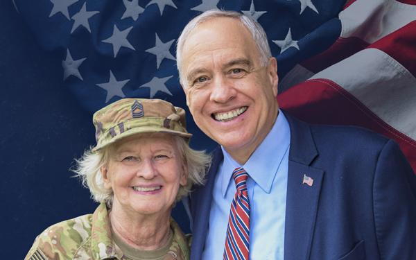 comptroller dinapoli standing with a veteran