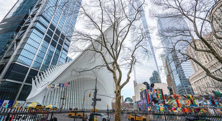 street view looking at the oculus building and freedom tower in lower manhattan