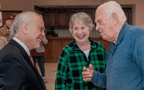 state comptroller dinapoli having a conversation with two new york state retirees