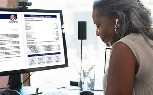 retiree looking at annual statement online