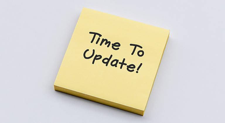 notepad that says 'time to update!'
