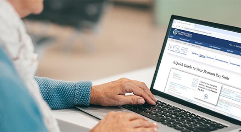 Woman at laptop viewing the NYSLRS interactive pay stub tutorial