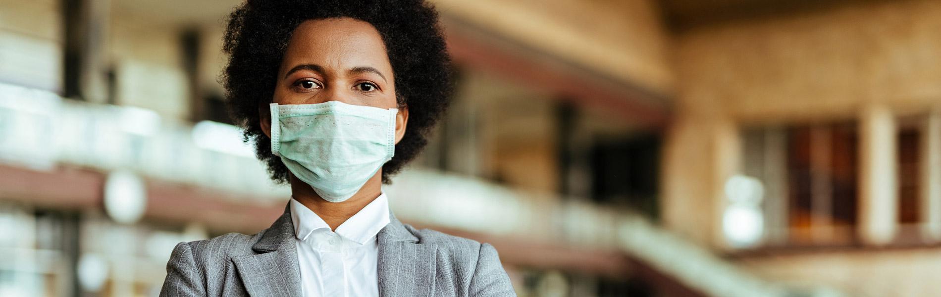 Professional woman wearing a N95 mask