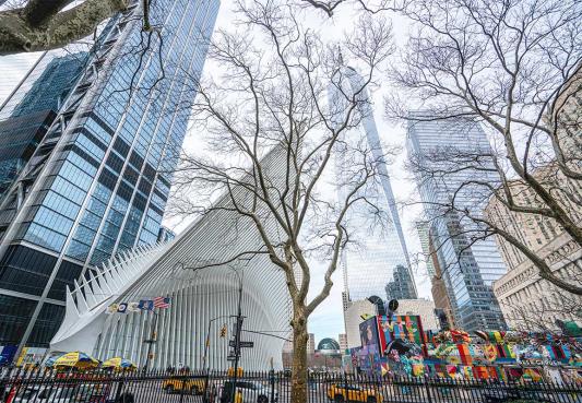 street view looking at the oculus building and freedom tower in lower manhattan