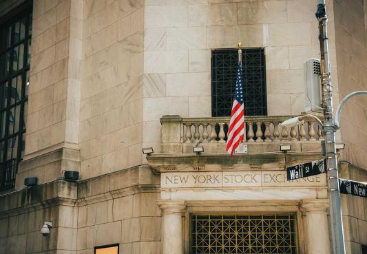 photograph from the street looking at the front of the new york state stock exchange building