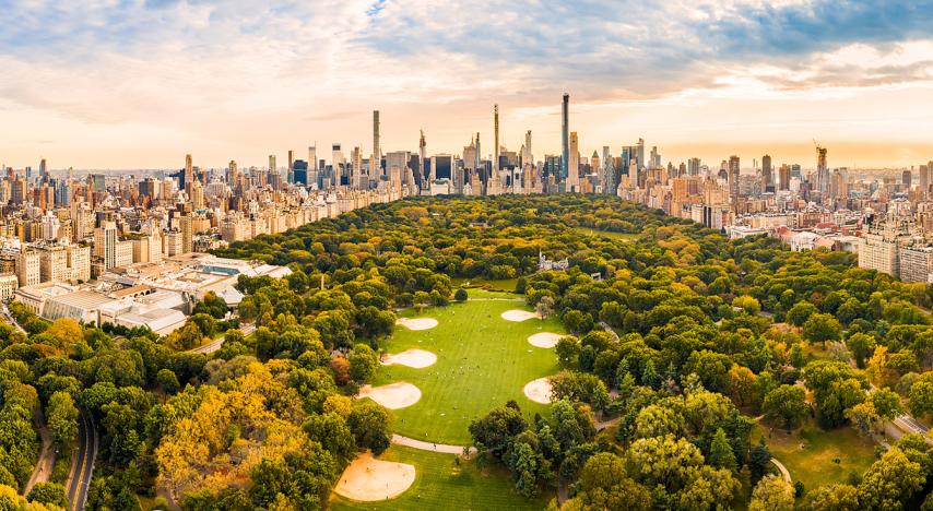 aerial panorama of new york midtown skyline at sunset viewed from above central park