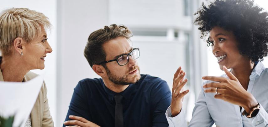 Three people in a meeting